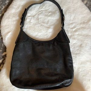 Black Prada shoulder bag with silver hardware.